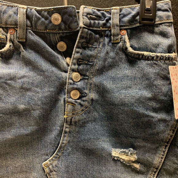 FREE PEOPLE
Destroyed Button Denim Skirt In Harvey - Picture 10 of 15
